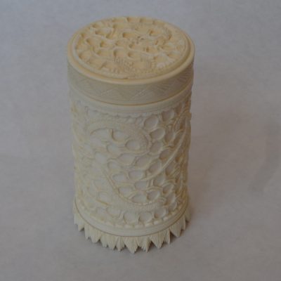 Hand-carved Chinese ivory box with lid in intricate dragon motif