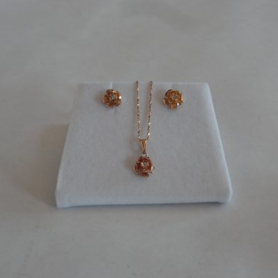 Gold and diamond necklace and matching earrings