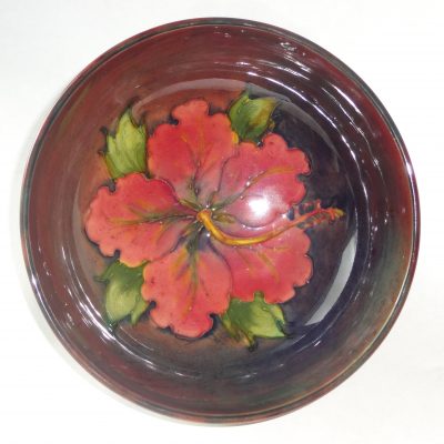 Moorcroft Hibiscus bowl with flambe glaze, painted Walter Moorcroft initials / top view