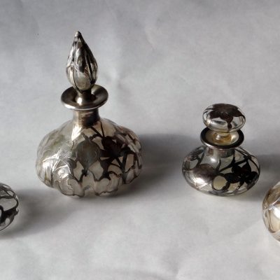 Glass and sterling perfume bottles