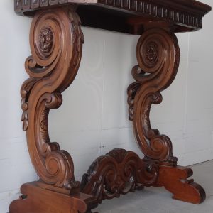 Heavily carved side table