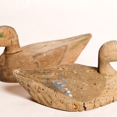 62   Pair of duck decoys   hand-carved with original  paint remaining. Early 20th  century.  