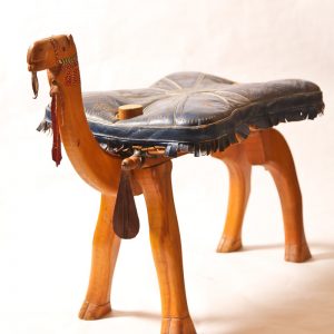 79.  Footstool. African hardwood. Camel motif. Mid 20th century. 