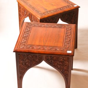 60.  Indian teak side tables. In-carved in floral motif with Persian style arches. Late 20th century. 