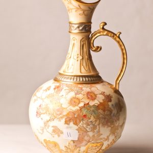 11.  Porcelain Ewer. Royal Doulton Burslem. Floral motif. Marked "French Porcelain". 13" H. Late 19th century. 