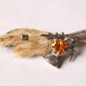 2.  Kilt pin. English sterling silver and rabbit foot. Late 19th century.  