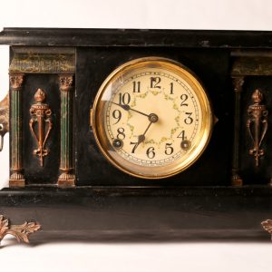 52.  Mantle clock. Sessions Company. With brass mounts and ebonized case. Early 20th century. 