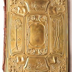 12. Art nouveau brass book cover.  Original leather back and hand embossed front. Early 20th century.  