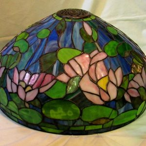 47. Tiffany-type leaded glass shade. Over 300 glass pieces, mounted as floor lamp on solid turned walnut stand. 72" h, 20" diameter.  
