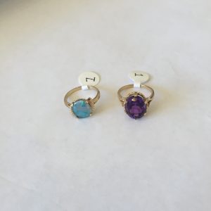 1. Two 14kt gold rings. One with centre opal, the second with simulant.  